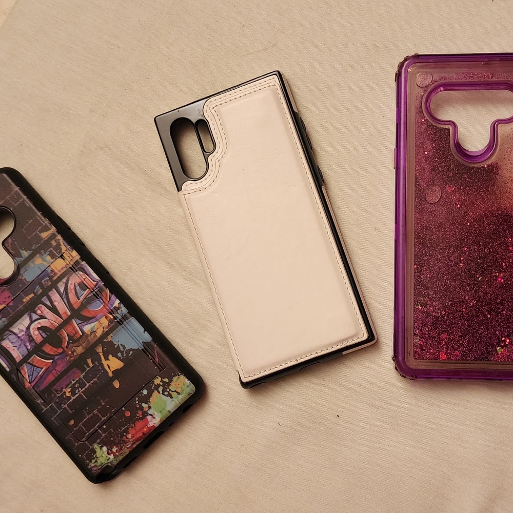 Two LG Stylo phone cases and one white Note 10 plus case